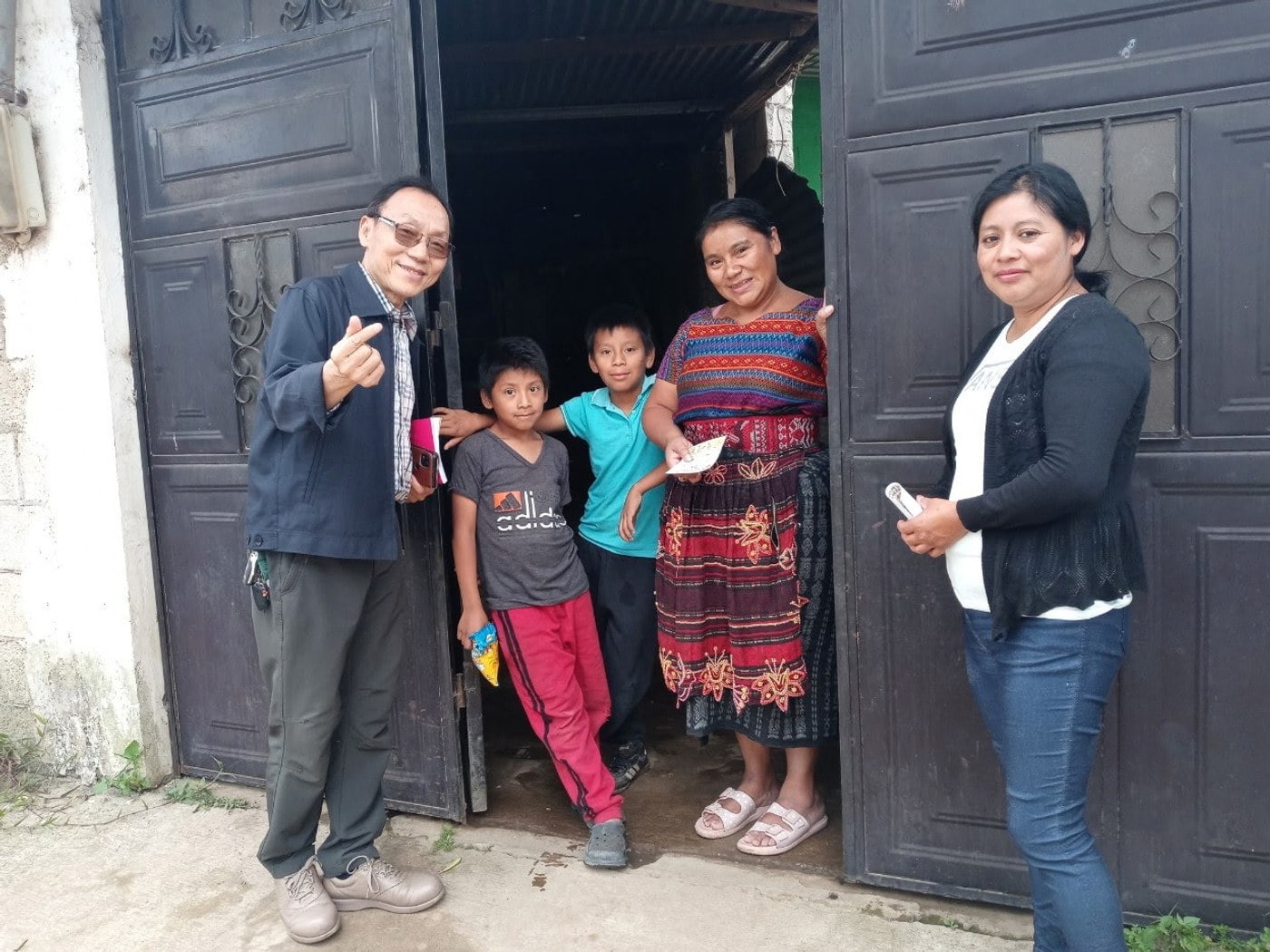 A missionary visiting a family